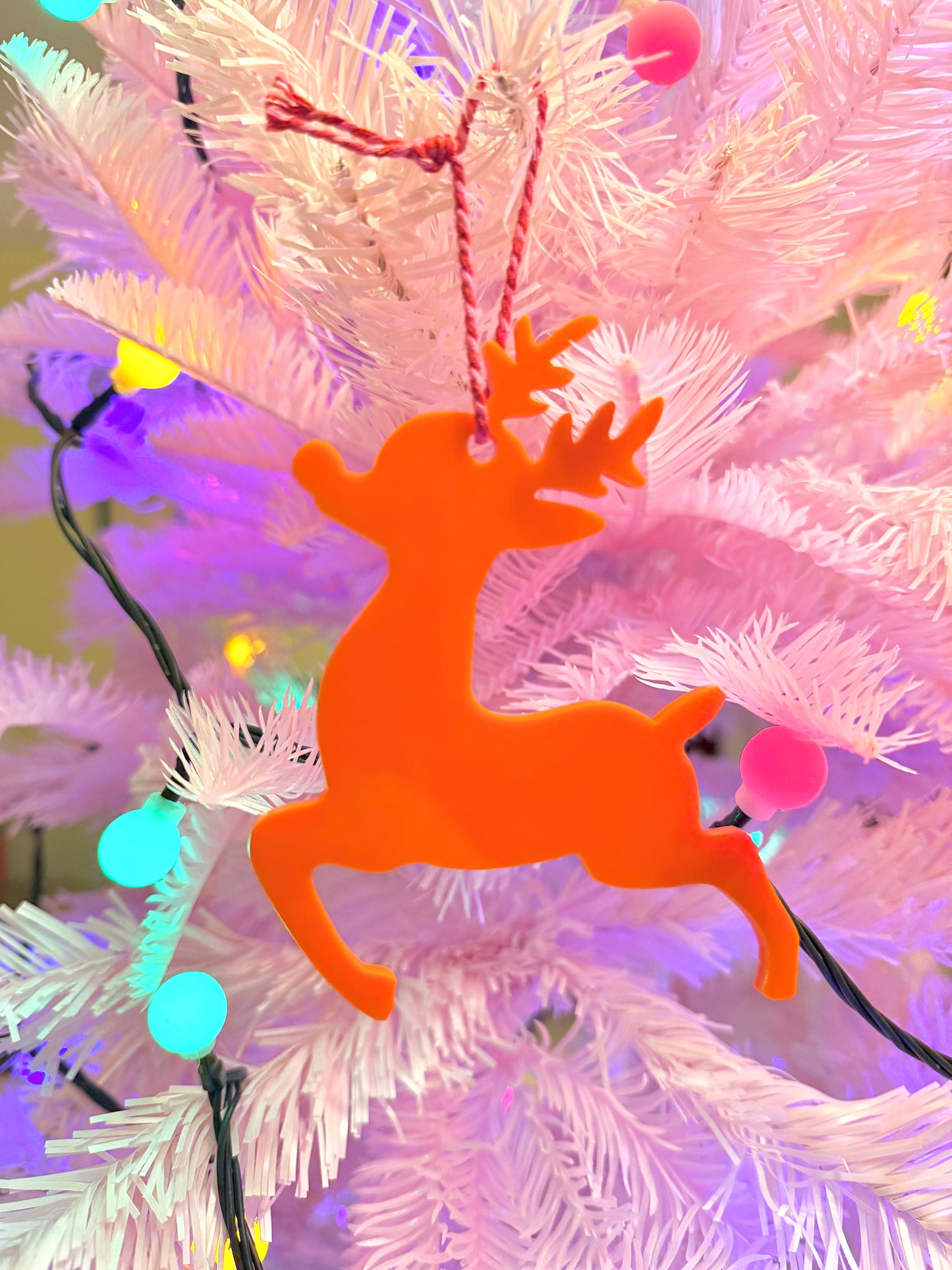 Hanging Reindeer Christmas Tree Decoration, All the colours of the Rainbow.
